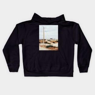 Bird Sitting on Telephone Pole in Dry North African Countryside Kids Hoodie